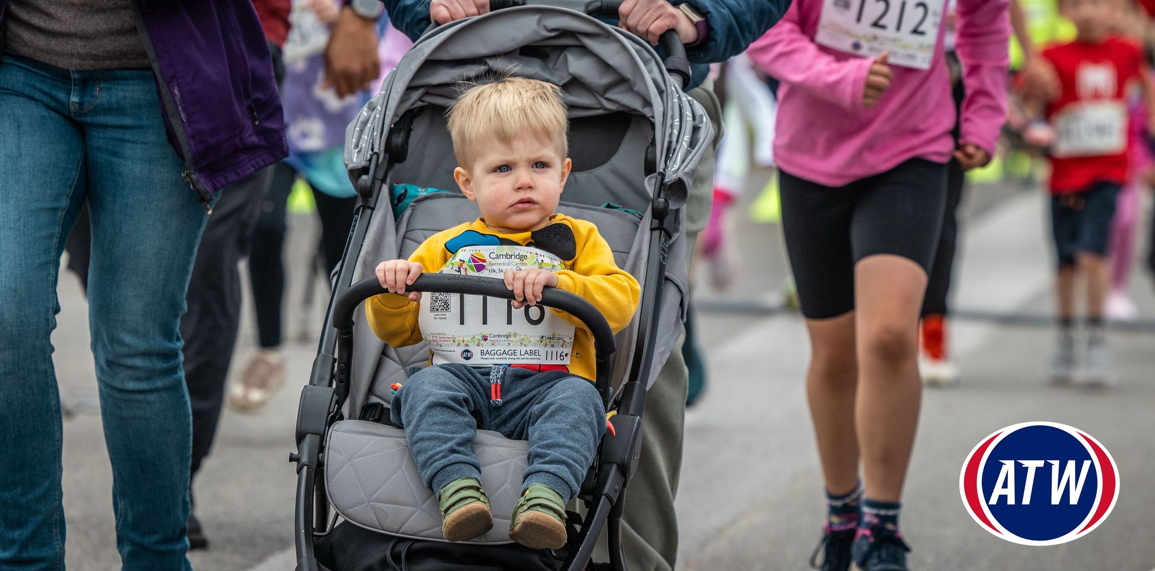 child in a pram at the CBC Fun Run