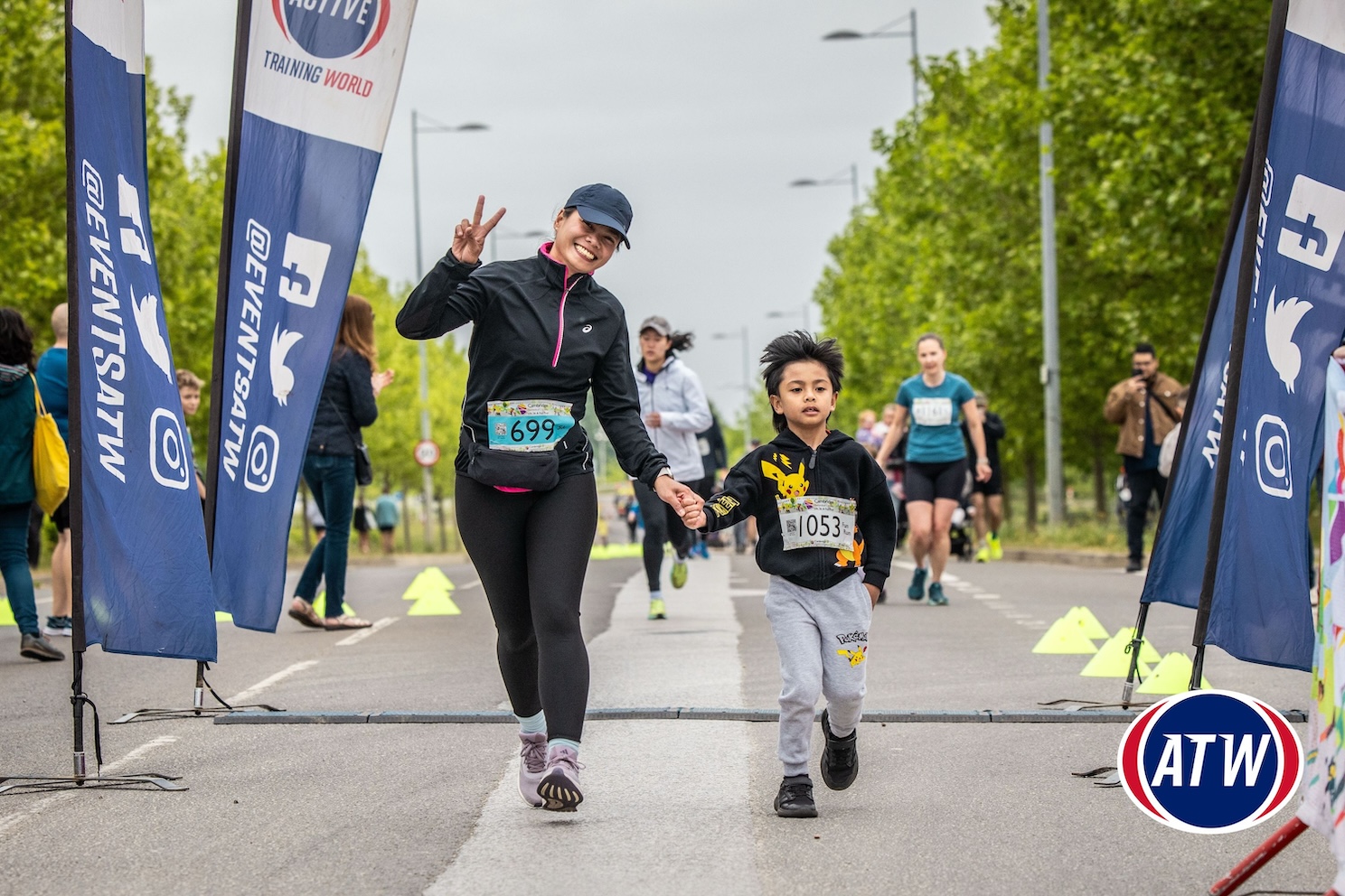 Woman and child taking part in the Cambridge Biomedical Campus Fun Run