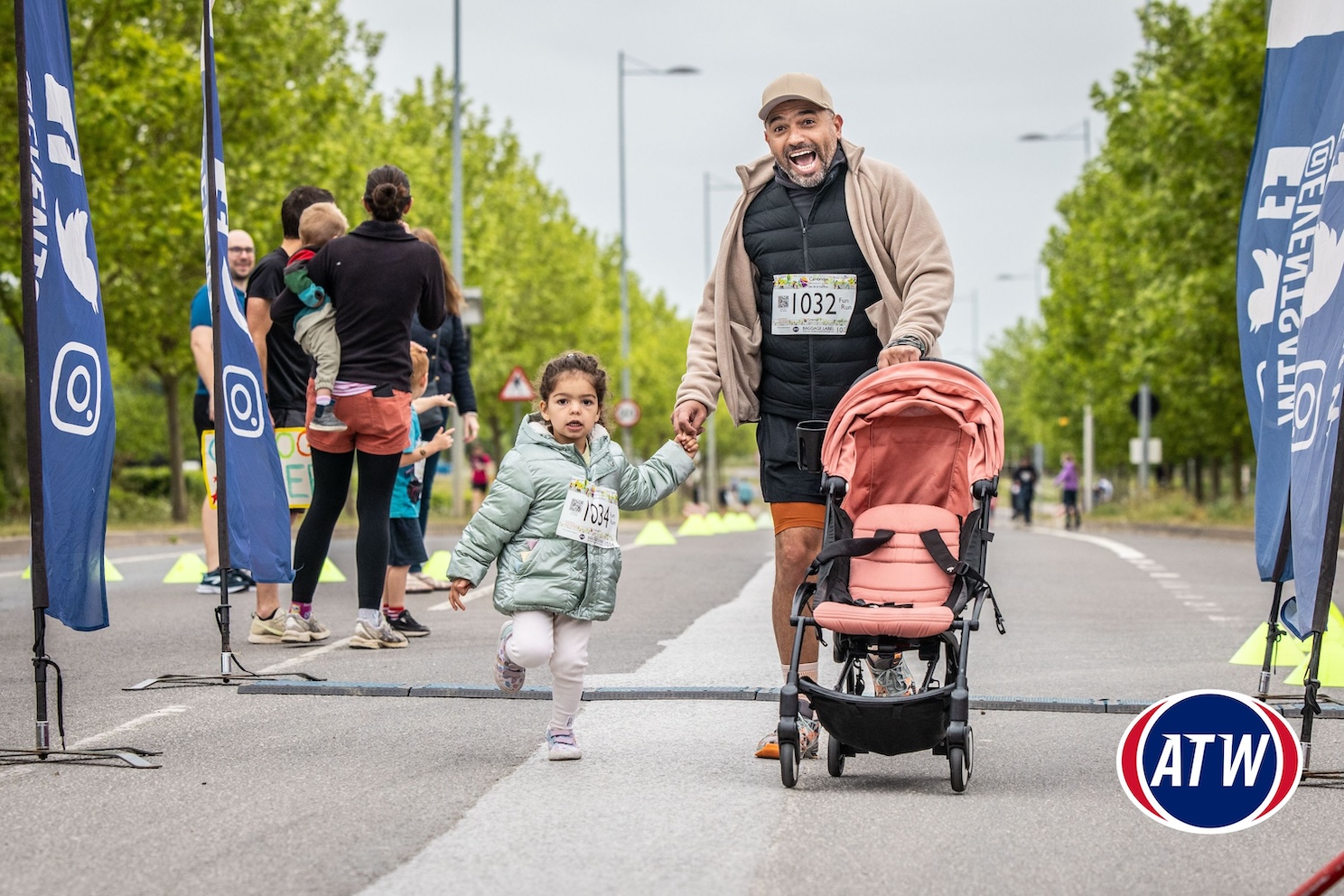 Man and child taking part in the Cambridge Biomedical Campus Fun Run